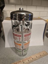 A Hazel-Atlas cocktail shaker with 12 printed recipes built right in is a functional time capsule from 1950s cocktail culture — barware and bartending guide in one.