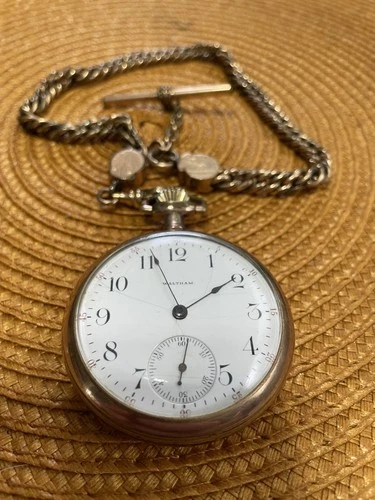 An Antique Waltham Pocket Watch With Chain