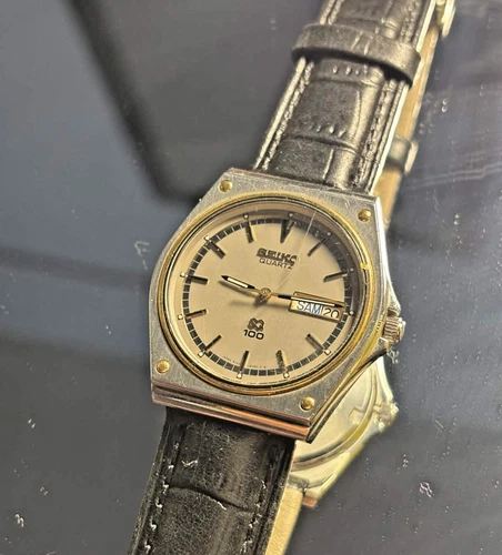 Vintage Seiko 8123-6030 Quartz Day Date 10 ATM Dual Language Parts/Repair