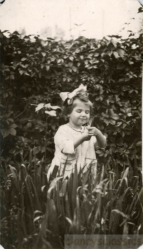1924 Little Girl in Romper Child Like WONDER of Nature Holds Leaf in Garden