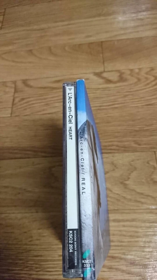 Набор компакт-дисков L'Arc-en-Ciel x2 【REAL】【HEART】 набор альбомов (б/у) S08628 комплект сделка - Изображение 2 из 3