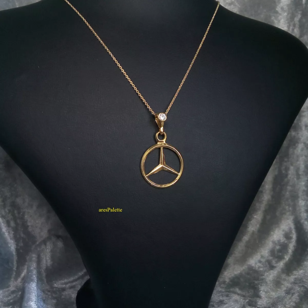 Mercedes benz hotsell gold pendant