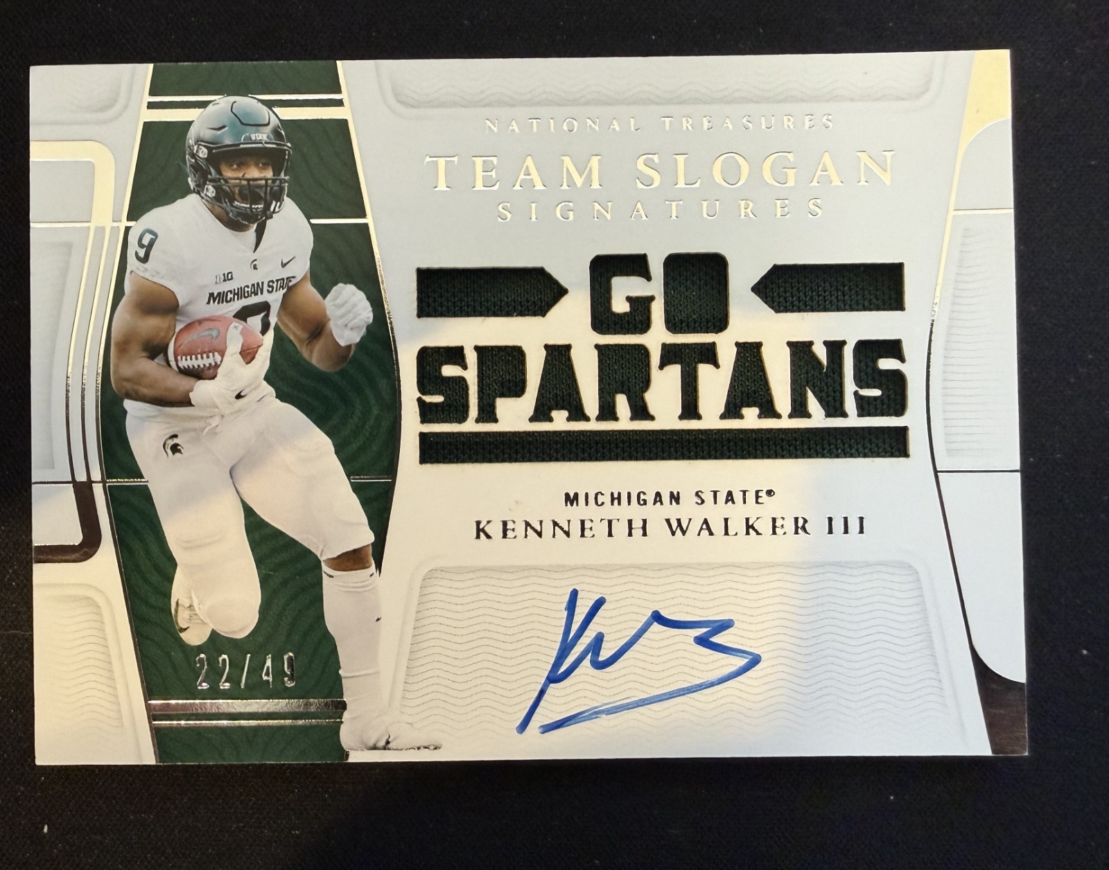 Kenneth Walker III Panini National Treasures Collegiate Team Slogan Signatures Die-Cuts #SLKWA Base