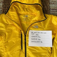 Preços baixos em Capa Externa de Nylon The North Face Amarelo - Main Image