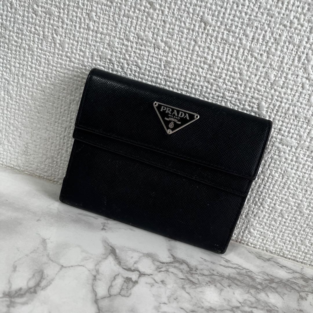 Prada triangular logo leather mini trifold wallet in excellent condition