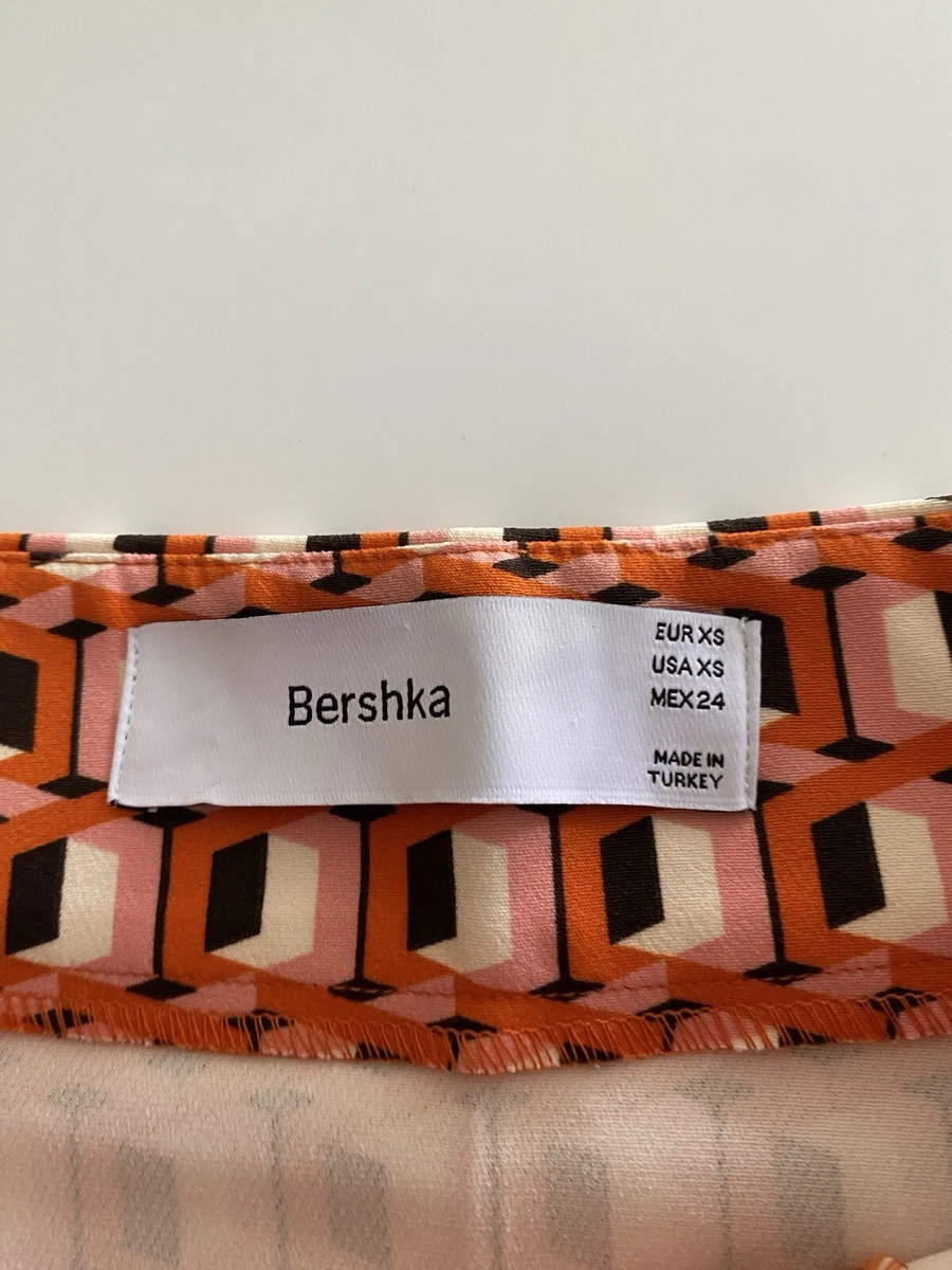 Minifalda Bershka Naranja, Blanco y Negro Talla XS Excelente Estado Apenas Usada