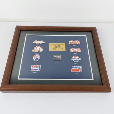 The Pepsi Logo Revolution Bild 1898-1998 10 Pins im Rahmen 32 x 25cm Werbung
