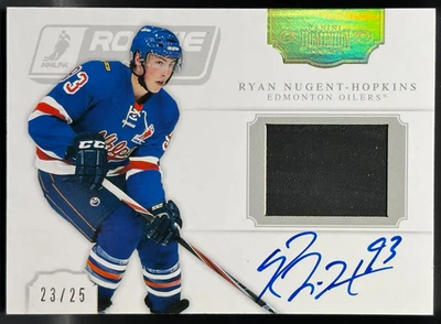 Nugent-Hopkins / Landeskog 2011-12 Dominion Rookie Showcase Auto Puck #1 - 23/25 - Image 1 of 2