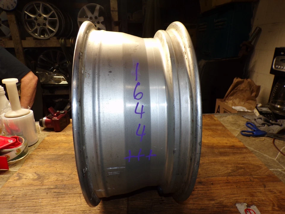 Llanta Cadillac Allante 1989-1992 16x7 5 tacos 115 mm con tapa central OEM Foto 2 de 4