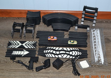 Lifelike Midnight Stunt Racers Glow-in-the-Dark HO Slot Car Race Track Set