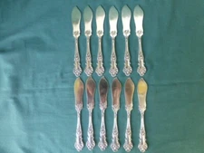 12 1847 Rogers Bros.  Charter Oak Pattern Flat Handle Butter Spreader Knives