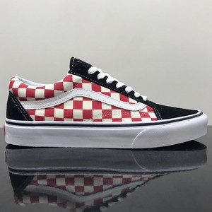 vans old skool trainers in black and red checkerboard