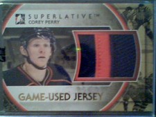 COREY PERRY   AUTHENTIC TWO-COLOR SEAMED PIECE OF A GAME-USED JERSEY /9  SP