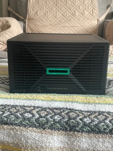 HP Microserver Gen 11 (used for 1 week) 32 GB Memory  (1) 4TB & (3) 1 TB Drives