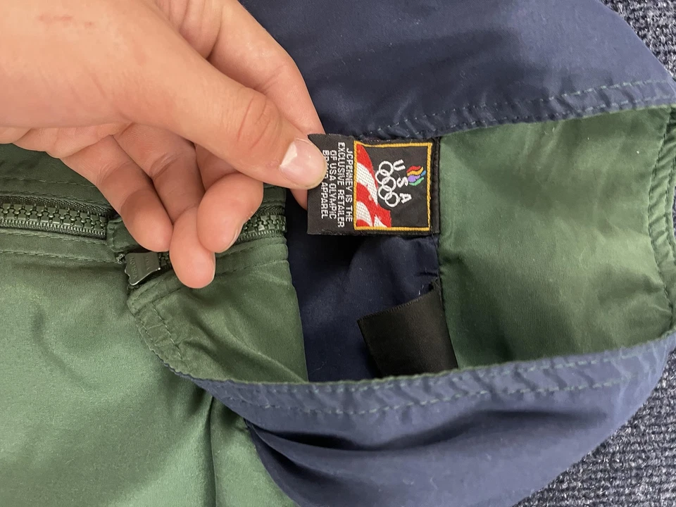 Chaqueta cortavientos Team USA Olympics para hombre verde azul marino cremallera completa bloques de color pista Foto 3 de 4