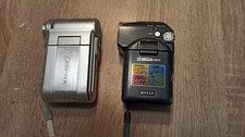 2 vintage digital cameras. work, but no chargers