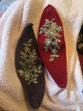 2 hand knitted headbands with crystal and gold-toned floral embellishments,New