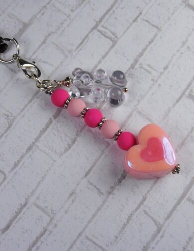 Bracelet lanière breloque téléphone portable coeur ours en caoutchouc rose transparent neuf - Photo 3 sur 3
