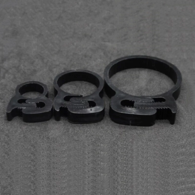 712145703967 UPC - Unique-Bargains 9SIA27C6E77742 18.8mm 21.6mm Double Gripping Ratchet Plastic Hose Clamps Clips Fasteners 4 Pcs | UPC Lookup