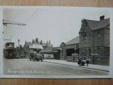 REAL PHOTO WOODGRANGE PARK STATION WITH TRAM & MOTOR BUS FOREST GATE LONDON