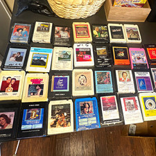 Vintage 8-track tape collection sold as one lot. Approximately 30 tapes