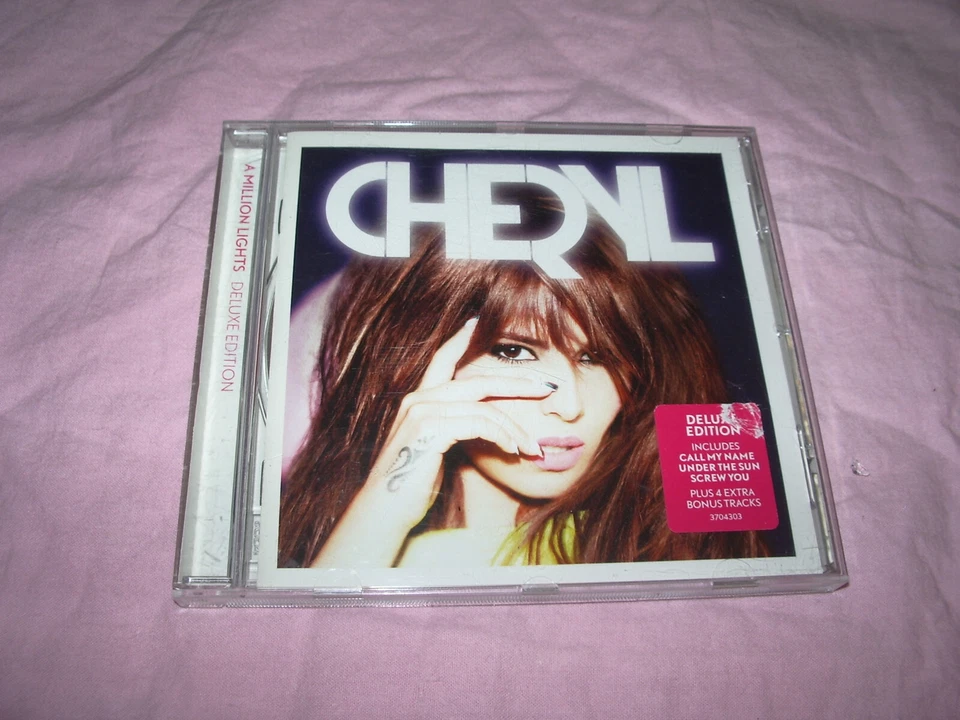 /// CD ALBUM CHERYL A MILLION LIGHTS 2012 - Photo 1/3