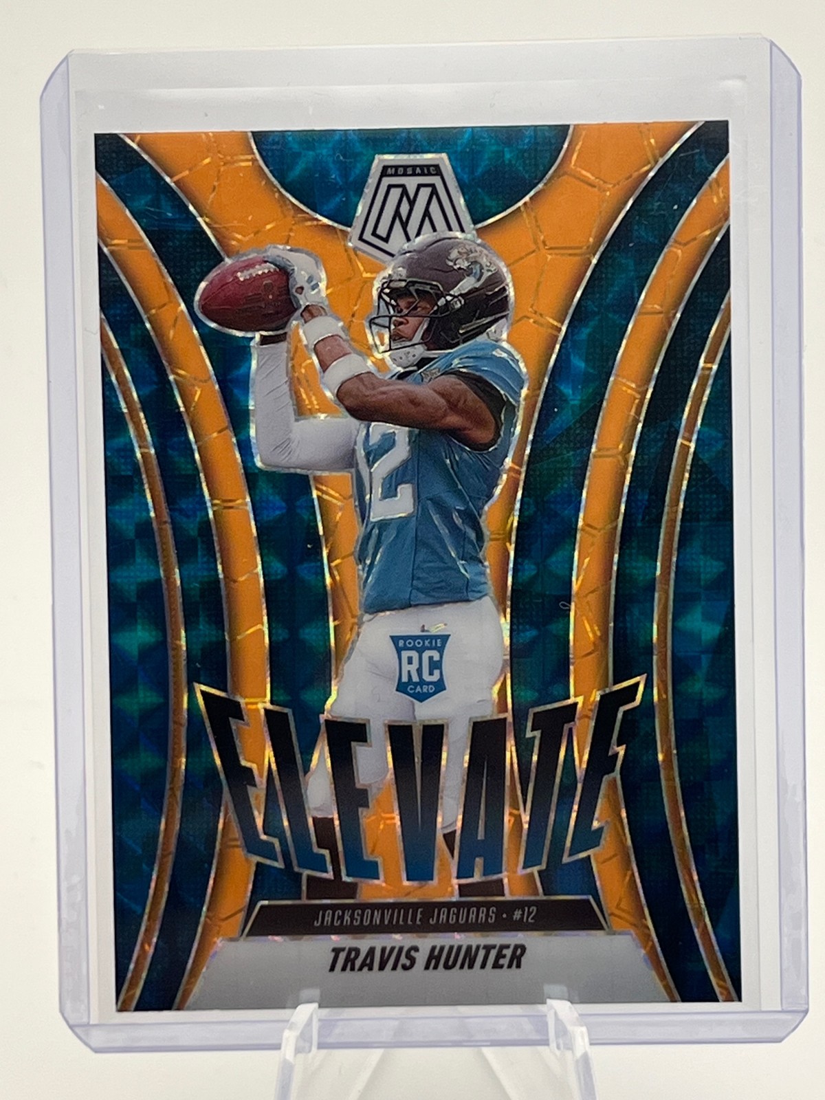 2025 Panini Mosaic #1 Travis Hunter Elevate Mosaic Orange Fluorescent