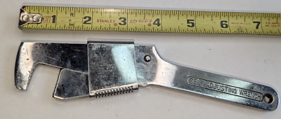 #ad SELF ADJUSTING WRENCH $25.00