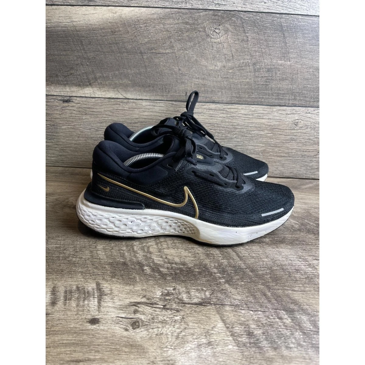 Nike ZoomX Invincible Run Flyknit Black Metallic Gold | eBay