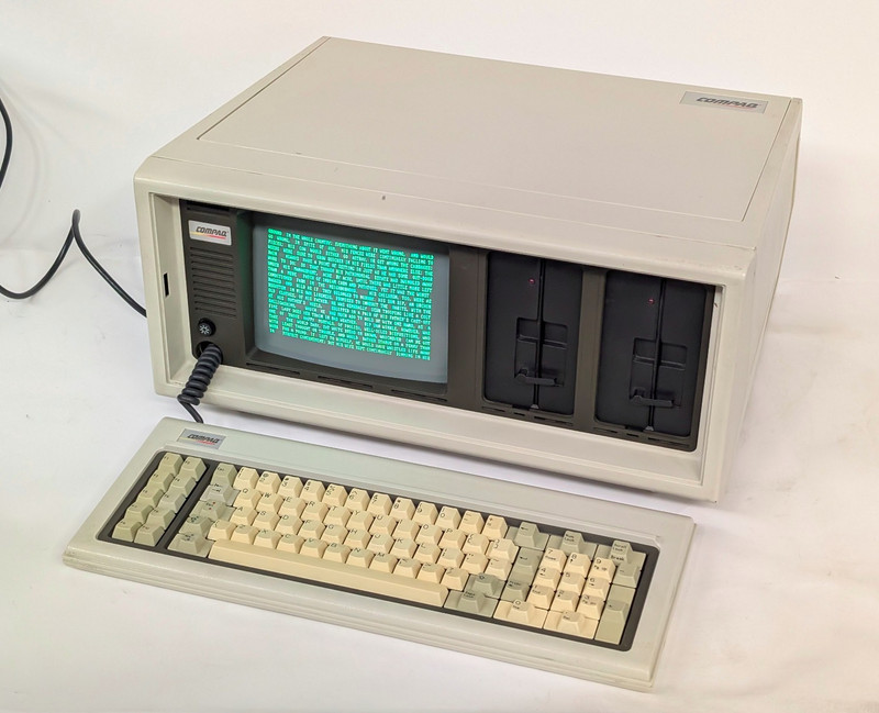 Compaq Portable Luggable Computer 1980s; reconditioned; new foam and foil; works