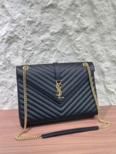 Saint Laurent Black Quilted Shoulder Bag with Gold Chain Strap, Logo Accent