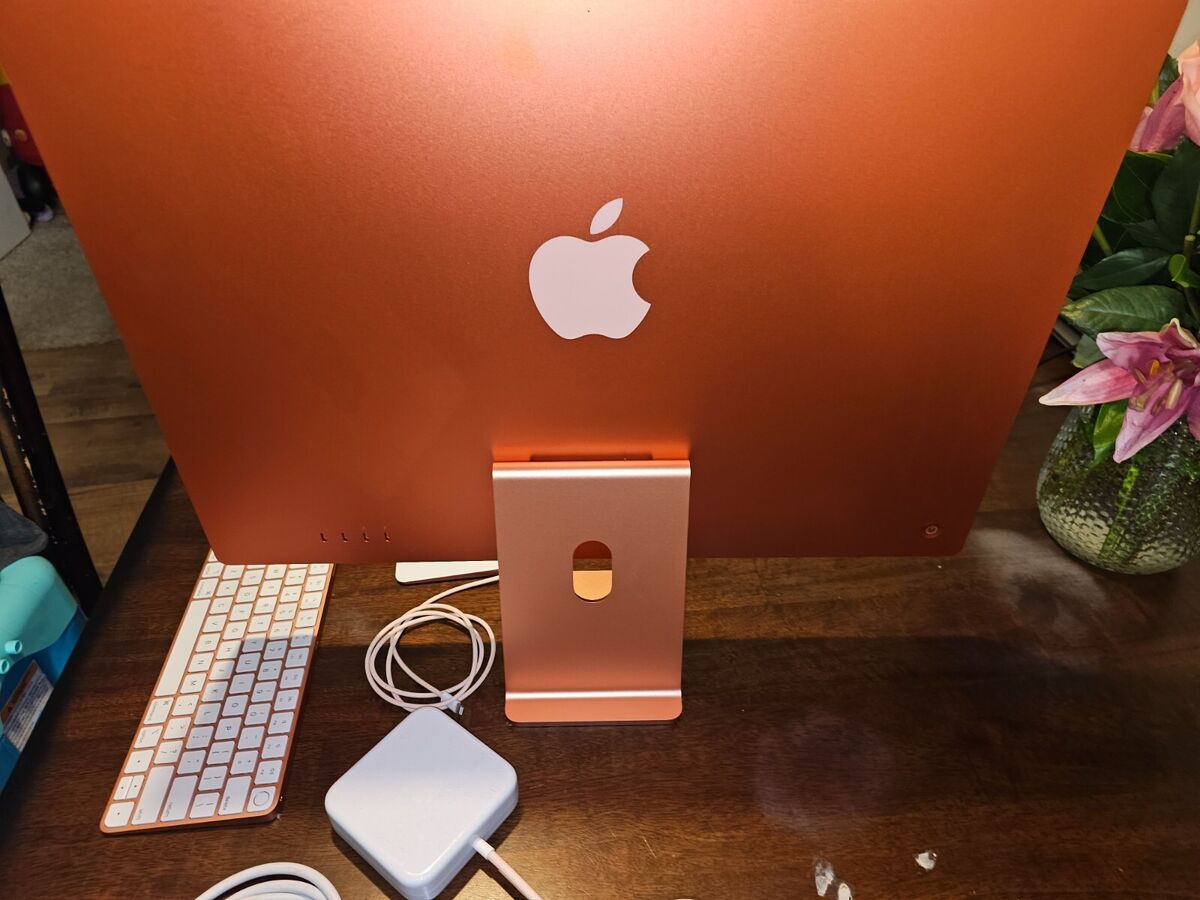 Orange Apple 2021 iMac, 24-inch 4.5K screen, m1 Apple Chip Orange Apple 2021 iMac, 24-inch 4.5K screen, m1 Apple Chip