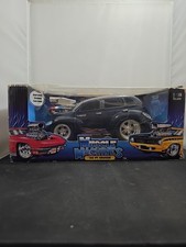Muscle Machines 1:18 Scale 2000 PT Cruiser Black Die-Cast Car W/ Box (UA)