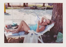 Elderly Lady in Swimsuit Lounging on the Beach Lost in Pages Cute Woman Photo