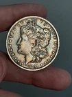 1891- O MORGAN SILVER DOLLAR CLASHED E REVERSE