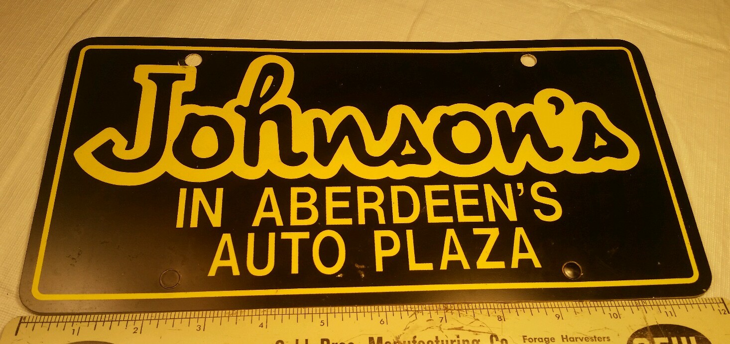 VINTAGE Advertising Dealership Plastic License Plate Auto Dealer