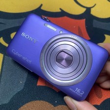 SONY Cyber Shot DSC-WX7 Purple 16.2MP Digital Camera 5x Optical Zoom English