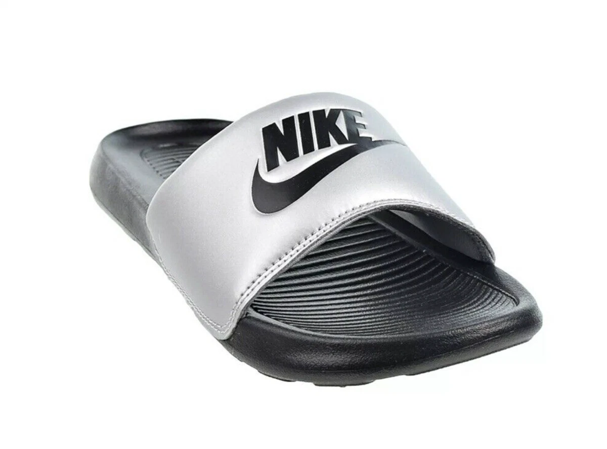Silver top nike sliders