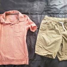 Boys med khaki shorts and polo