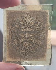 Stained glass Green Man piece fragment kiln fired amber glass
