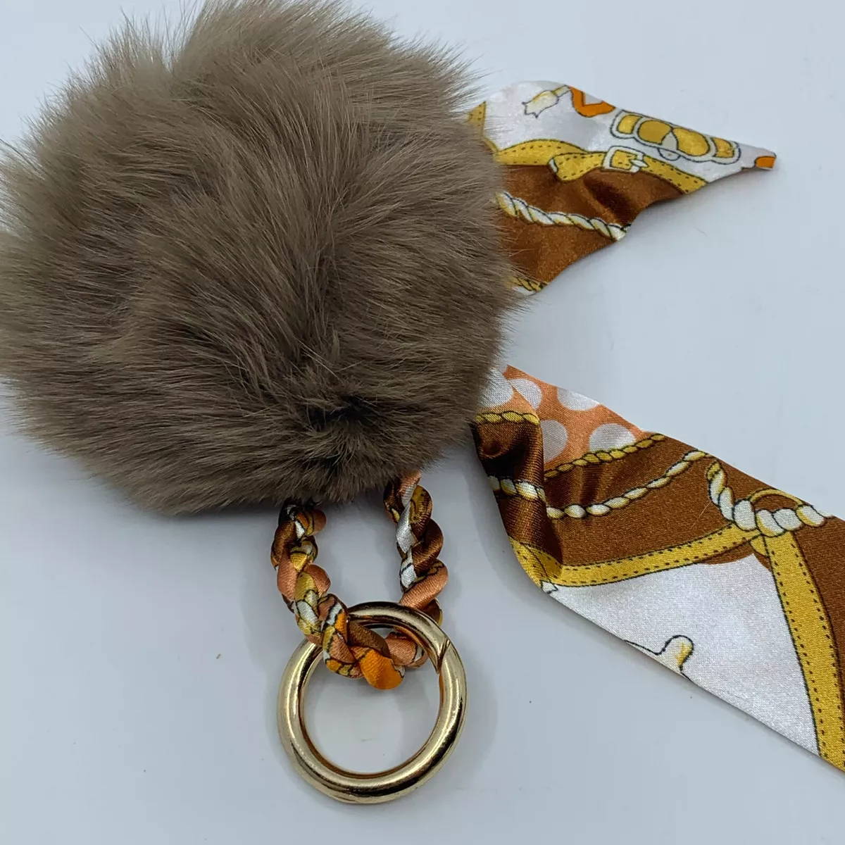 Lv pom deals pom keychain