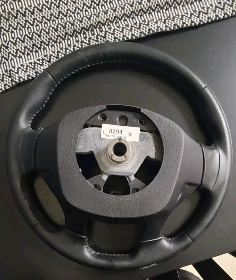 Volante Nissan Altima 2010-2012 cuero negro OEM  Foto 3 de 4