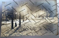 Antique RPPC 1917 nighttime snowy street scene Real Photo Postcard 
