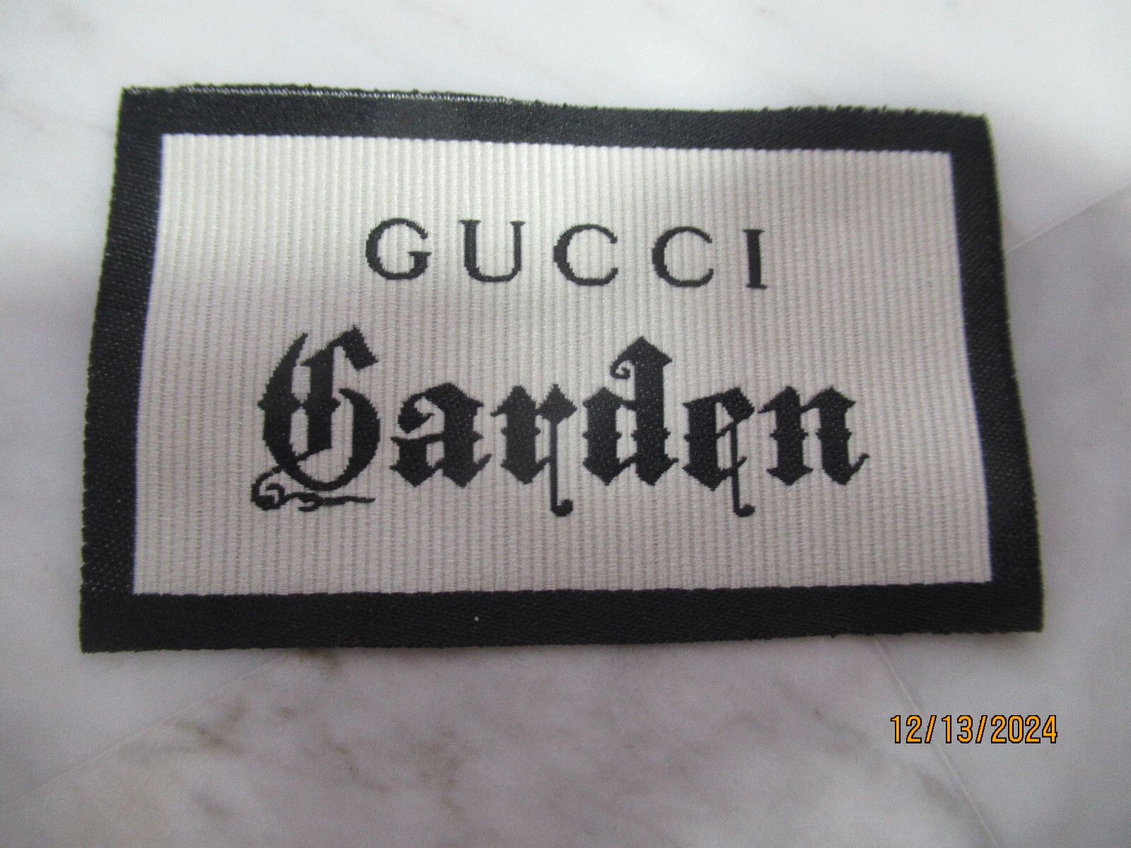 GUCCI 1 étiquette de créateur de vêtements ÉTIQUETTE accessoires de couture de remplacement lot 1