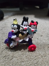 Vintage 1993 McDonald's Animaniacs Yakko Wakko and Dot on a Purple Tricycle