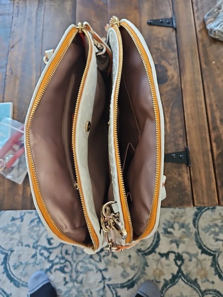 Bolso de mano Coach de cuero con relieve de avestruz Foto 4 de 4