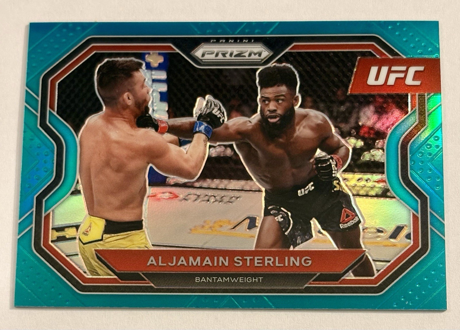 2021 Prizm Debut UFC Aljamain Sterling Teal SSP /49