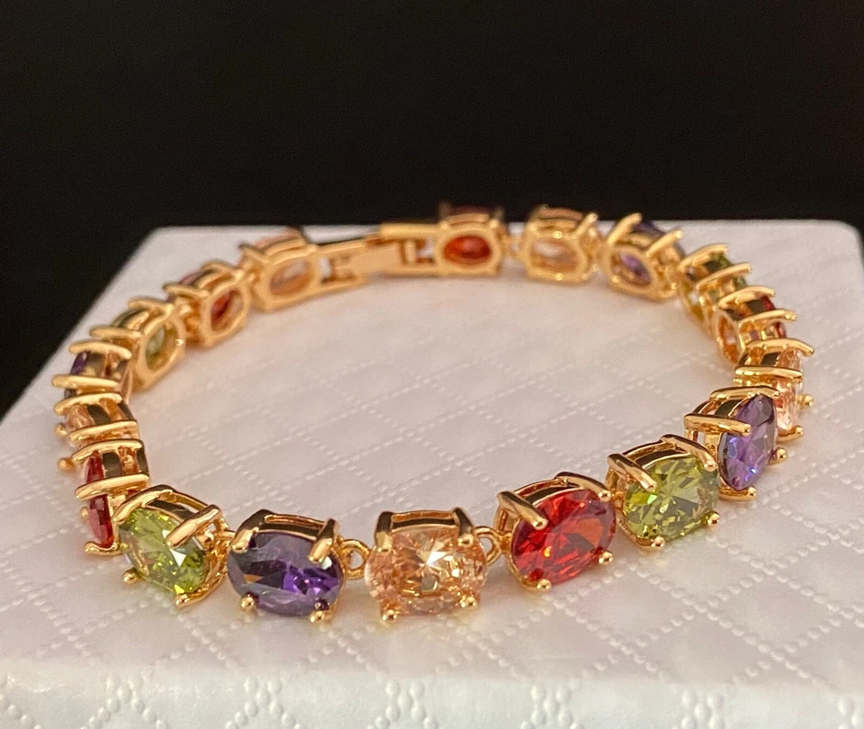 Brazalete Tenis 30 cwt Ovalado Multicolor Gemas Acabado Chapado en Oro 18K 7.5" Foto 2 de 4