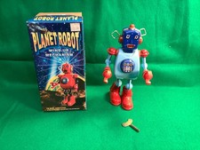 Schylling Blue Planet Robot Wind-up Tin Toy T...