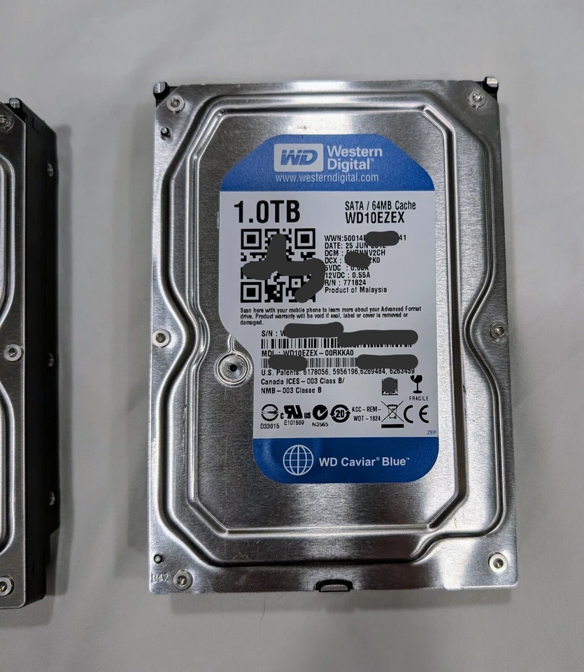 Lot 4 Hard Drives-Intel SSD 60GB, WD Scorpio 320GB, 2x WD Blue 1TB (1 noisy) - Image 2 of 4